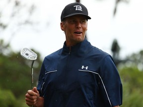 NFL player Tom Brady of the Tampa Bay Buccaneers reacts on the 11th green  during The Match: Champions For Charity at Medalist Golf Club on Sunday in Hobe Sound, Florida.