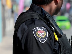 OTTAWA - MAY 5, 2020 -  Ottawa Police officers on Bank street May 5, 2020.