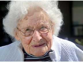 Pearl Mundt chats with others and gets some fresh air outside Almonte Country Haven. She contracted COVID-19 last month and has since recovered.