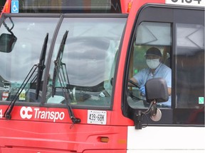 OTTAWA- May 27, 2020 -- OC Transpo bus driver wearing a face mask in Ottawa, May 28, 2020.