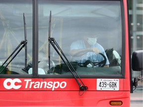 OC Transpo bus driver wearing a face mask in Ottawa.