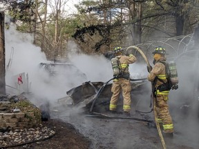 Fire at 6183 Carp Road  On arrival crews had a garage with 2 cars inside & 1 vehicle outside fully involved 20 feet from a house. Quick work prevented the fire from spreading to the house and surrounding woods.