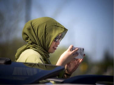 OTTAWA -- May 23, 2020 -- Adilah Makrup snapped a couple photos through the sunroof of her vehicle during a special drive-in Eid prayer that was held at the Ottawa Mosque on Northwestern Ave, Saturday, May 23, 2020. ASHLEY FRASER, Postmedia