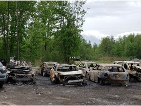 An Ottawa Police Service photo of the damaged vehicles at the property on Leitrim Road.