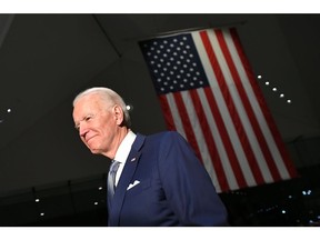 In this file photo taken on March 10, 2020, Democratic presidential hopeful Joe Biden leaves after speaking at the National Constitution Center in Philadelphia, Pennsylvania. On May 1, 2020, Biden emphatically denied sexually assaulting a former staffer, saying the incident she claims occurred in 1993 "never happened."