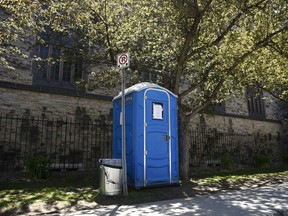 A porta-pottie beside Knox Presbyterian Church in downtown Ottawa, placed to allow people including those who are homeless or precariously housed to access a washroom, is seen on Wednesday, May 20, 2020 during the COVID-19 pandemic.