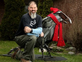 Using two old bathtubs, some car parts and a plow share, Dave Harries has made a huge sculpture he called Crowvid-19.  He invited people to bid on having the sculpture displayed at their home for a week to raise money for the Ottawa Food Bank.