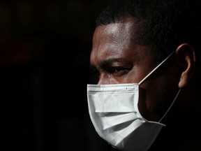 A security guard wears a protective mask at University Hospital Antwerp (UZA) in Antwerp, Belgium May 29, 2020.