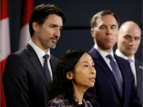 Files: Canada's Chief Public Health Officer Dr. Theresa Tam speaks at a news conference earlier this year with Prime Minister Justin Trudeau, Minister of Finance Bill Morneau and Treasury Board President Jean-Yves Duclos in Ottawa.