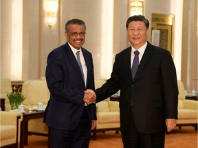 Tedros Adhanom, director general of the World Health Organization, shakes hands with Chinese President Xi jinping before a meeting at the Great Hall of the People in Beijing, China, January 28, 2020.