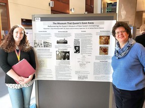Elyse Richardson, left, a fourth-year student of classics and art history at Queen's University, and Barbara Reeves, an associate professor and an archeologist in the classics department at Queen's with a poster highlighting a former archeological museum on the Queen's campus.