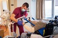 A member of the Canadian Forces works in a long-term care facility during the COVID-19 pandemic. Canadian Forces photo.