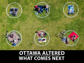 An aerial view shows people gathered inside painted circles on the grass encouraging social distancing at Dolores Park in San Francisco, California on May 22, 2020.