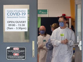 OTTAWA - Line ups were longer at the COVID-19 Assessment Centre at Brewer Arena in Ottawa Monday, May 25, 2020,  after Premier Doug Ford said on the weekend that anyone in Ontario could request a test.