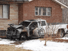 A burned-out tow truck found during Project Platinum.