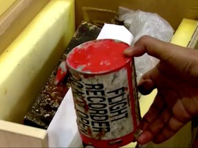 A flight recorder, also known as a black box, purportedly recovered from the crashed Ukrainian airliner, Boeing 737-800, is seen in this still image taken from a video, in Tehran on January 10, 2020.