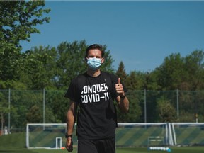 Montreal Impact player Jukka Raitala wears a Conquer COVID-19 T-shirt at the team’s Centre Nutrilait practice facility.