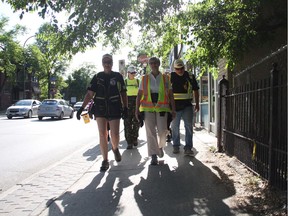 The West Broadway Bear Clan Patrol (accompanied by a Canadian senator) on a walk through the Winnipeg community  last summer. It's a model of policing that could be adopted elsewhere.