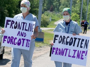 Ontario healthcare workers protest over pandemic pay.