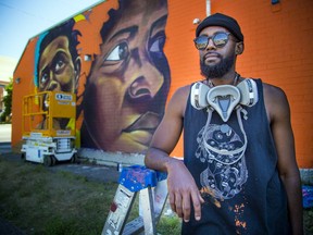 Kalkidan Assefa who is known as DRPN Soul, a local artist and muralist was working on a large mural on Somerset Street Saturday, June 20, 2020. ASHLEY FRASER, Postmedia