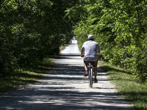 People cycling on the Trans Canada Trail.