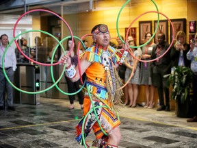 Dallas Arcand, three-time world champion hoop dancer of the Alexander First Nation performs at AltaLink in Calgary, on Tuesday June 19, 2018, as part of Aboriginal Awareness Week Calgary and National Indigenous Peoples Day.