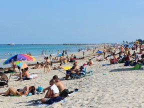 Files: Beachgoers take advantage of the opening of South Beach on June 10, 2020 in Miami Beach, Florida.