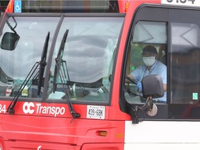 OTTAWA- May 27, 2020 -- OC Transpo bus driver wearing a face mask in Ottawa, May 28, 2020. Photo by Jean Levac/Postmedia News assignment 133931 Covid