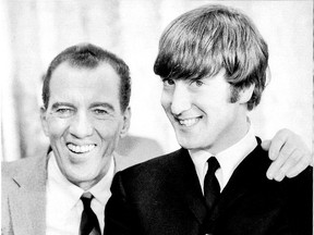 John Lennon with Ed Sullivan, 1964.