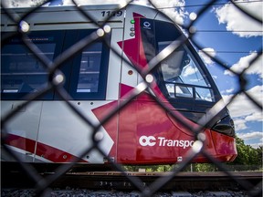 A train makes its way along the LRT line near Tremblay Station on Sunday.