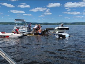 Boaters rescue the pilot of one of two planes involved in a mid-air collision over the Ottawa River near Arnprior on Sunday.  The second plane landed safely at the airport in Arnprior.