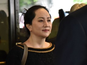 In this file photo,  Huawei Chief Financial Officer, Meng Wanzhou, leaves British Columbia Supreme Court,