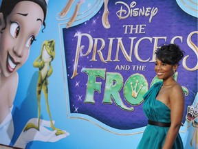 (FILES) In this file photo actress Anika Noni Rose, the voice of Princess Tiana (at left on the poster), poses as she arrives for the world premiere screening of Disney's "The Princess and The Frog," at Walt Disney Studios in Burbank, California on November 15, 2009, Princess Tiana is Disney's first African-American princess. - "Splash Mountain" rides at Disney theme parks will be rebranded with a film featuring the company's first black princess