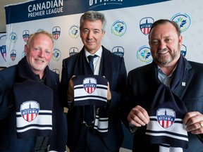 Atlético Ottawa Strategic Partner Jeff Hunt (L-R), Club Atlético de Madrid General Manager Miguel Ángel Gil, and Canadian Premier League Commissioner David Clanachan following the official announcement as the Ottawa club becoming the eightg team in the CPL. February 11, 2020.