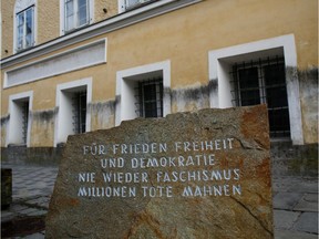 A stone outside the house in which Adolf Hitler was born, with the inscription 'For peace, freedom and democracy, never again fascism, millions of dead are a warning', is pictured in Braunau am Inn, Austria, October 22, 2016.