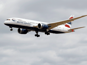 A British Airways Boeing 787 comes in to land at Heathrow airport in London as the U.K. government's planned 14-day quarantine for international arrivals to limit the spread of COVID-19 starts on June 8, 2020.
