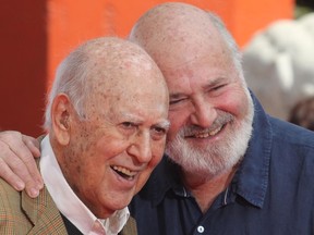 FILE: Carl Reiner, comedy legend and Dick Van Dyke Show star has died aged 98. Carl and Rob Reiner are seen here at their Hand and Footprint Ceremony at the TCL Chinese Theater IMAX in 2017.