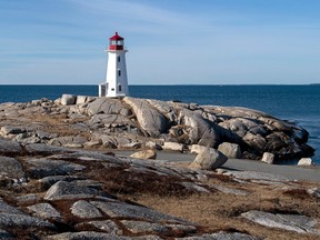 The lighthouse at Peggy's Cove, N.S., one of the favourite year-round destinations for visitors in Atlantic Canada, is seen on Monday, March 23, 2020.