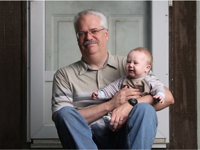 Robert Fairbairn and his seven-month old grandson, Lincoln.