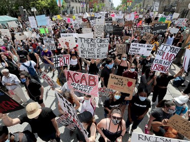 OTTAWA - Thousands of people gathered to join a Black Lives Matter protest and a support march for march for George Floyd in downtown Ottawa Friday June 5, 2020.