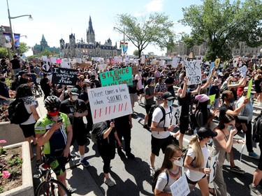 OTTAWA - Thousands of people gathered to join a Black Lives Matter protest and a support march for march for George Floyd in downtown Ottawa Friday June 5, 2020.