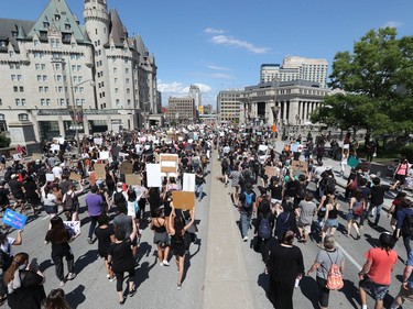 OTTAWA - Thousands of people gathered to join a Black Lives Matter protest and a support march for march for George Floyd in downtown Ottawa Friday June 5, 2020.