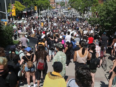 OTTAWA - Thousands of people gathered to join a Black Lives Matter protest and a support march for march for George Floyd in downtown Ottawa Friday June 5, 2020. Protesters gathered in front of the US Embassy in Ottawa Friday