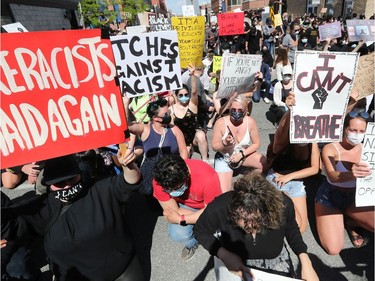 OTTAWA - Thousands of people gathered to join a Black Lives Matter protest and a support march for march for George Floyd in downtown Ottawa Friday June 5, 2020. Protesters gathered in front of the US Embassy in Ottawa Friday.