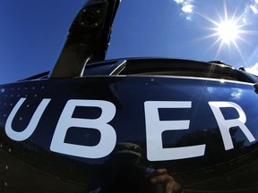 In this Monday, Sept. 12, 2016, file photo, a self-driving Uber sits ready to take journalists for a ride during a media preview in Pittsburgh. The Supreme Court of Canada is set to release a decision Friday morning that could advance the fight to get Uber Technologies Inc. drivers recognized as employees in Canada.