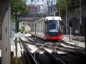 Files: A train rolls into Tunney's Pasture Station.