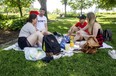From left, Kathleen Chandler, Gareth Rurak, Tyler Seal and Lisa Westlund spent Canada Day enjoying a picnic and games in Major's Hill Park.