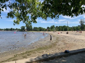 Early day swimmers were at Britannia Beach Sunday. A man's body was pulled from the water overnight.