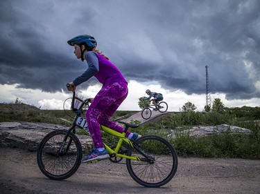 Zoë Worrall and Deryk Worrall whip through the the Carlington Bike Park Wednesday July 29, 2020.