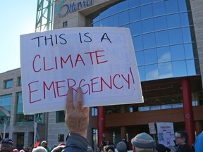 Ottawa residents show their priorities at a rally outside Ottawa City Hall in April, 2019.